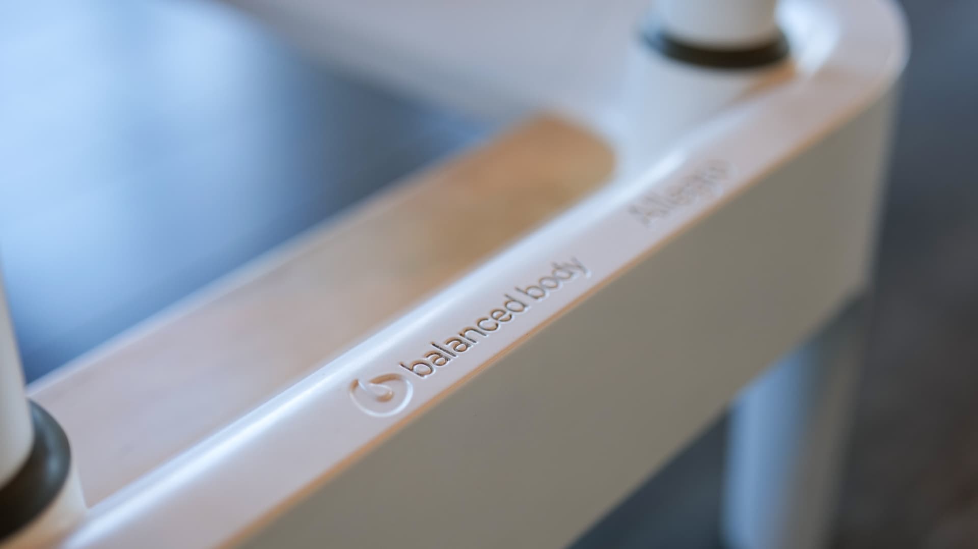 Strength and Reform class with Bala beams, bands, and Reformer at Root Fitness